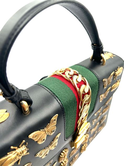 bolso gucci animal pattern|gucci animal logos.